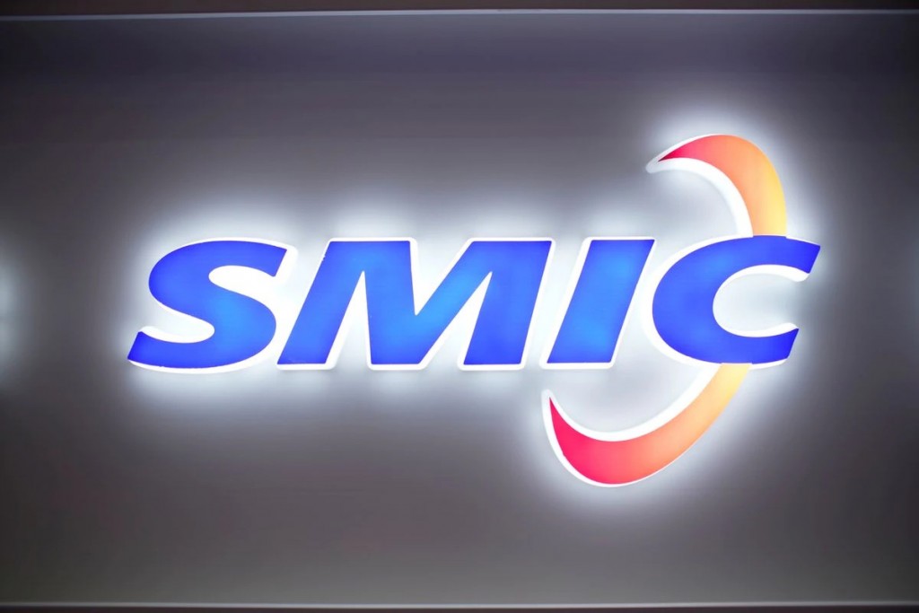 A logo of Semiconductor Manufacturing International Corporation (SMIC) is seen at China International Semiconductor Expo (IC China 2020) in Shanghai, ...