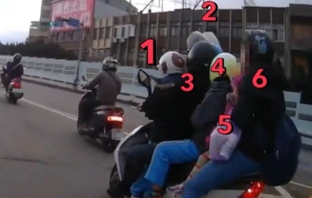 Family of six spotted on scooter. (YouTube, WoWtchout screenshot)
