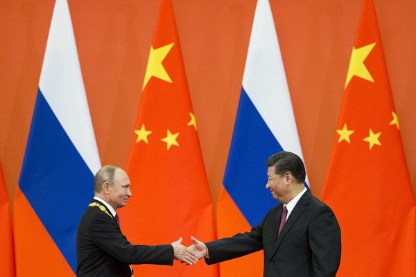 Chinese President Xi Jinping, right, and Russian President Vladimir Putin
