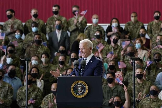 President Joe Biden speaks to American service members at RAF Mildenhall in Suffolk, England, Wednesday, June 9, 2021.
