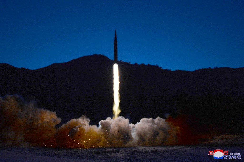 A missile is launched during what state media report is a hypersonic missile test at an undisclosed location in North Korea, January 11, 2022, in this...