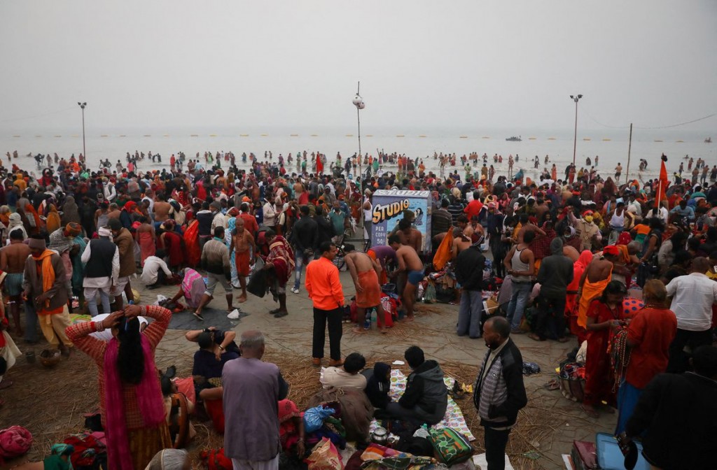 Hindu pilgrims gather to take a dip at the confluence of the river Ganges and the Bay of Bengal, on the occasion of "Makar Sankranti" festiv...