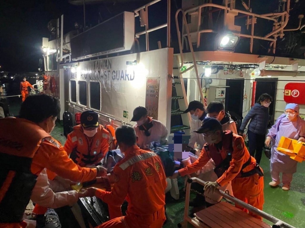 A Coast Guard ship transported two injured foreign visitors from Green Island to Taiwan's main island after a hit-and-run accident. (CNA, CGA phot...