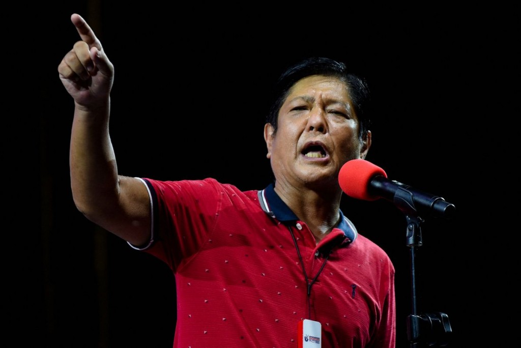 Philippine presidential candidate Ferdinand Marcos Jr., son of late dictator Ferdinand Marcos, gestures as he speaks during a campaign rally in Quezon...