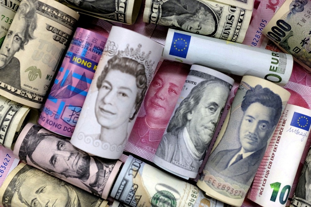 Euro, Hong Kong dollar, U.S. dollar, Japanese yen, pound and Chinese 100 yuan banknot...