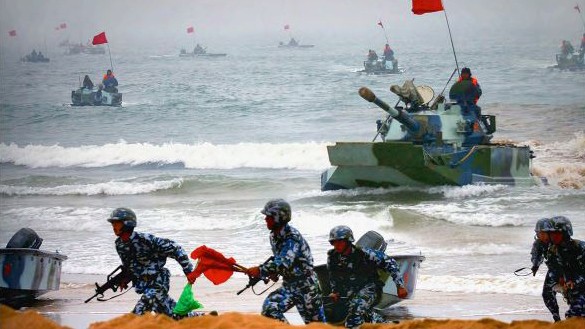 People’s Liberation Army Navy Marine Corps units conduct an amphibious landing during a training exercise. (U.S. Department of Defense image)
