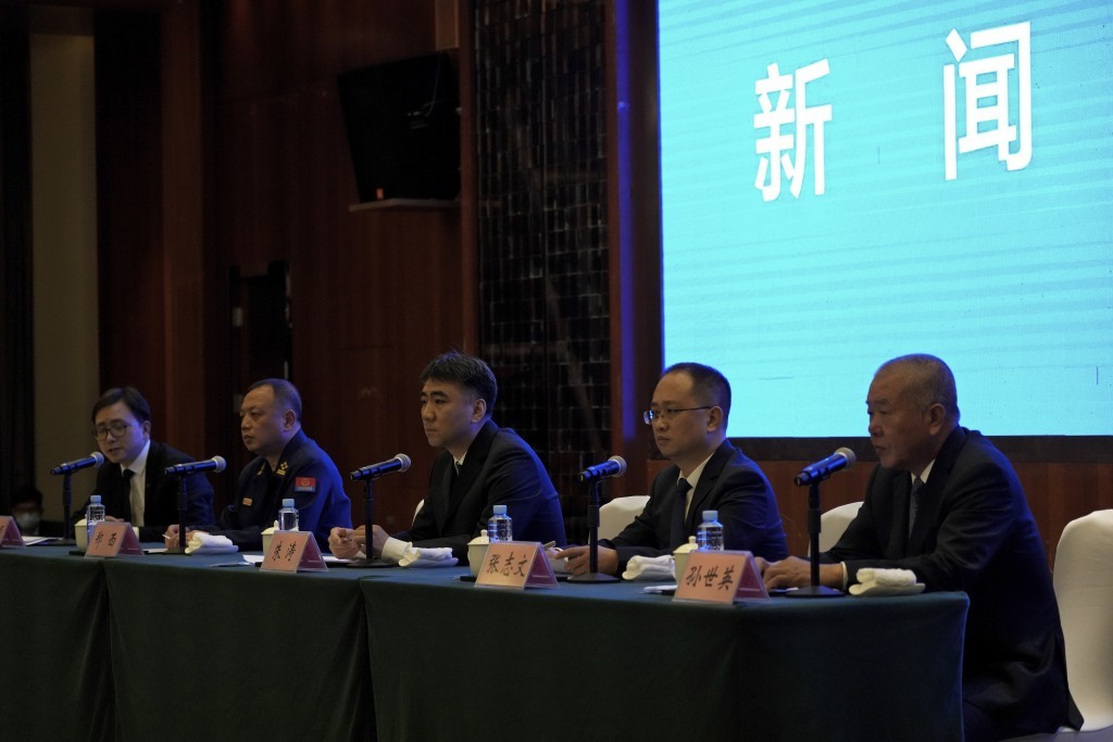 China Eastern Airlines Chair Sun Shiying (right) is criticized for deflecting questions and reading off a script during a press conference about ...