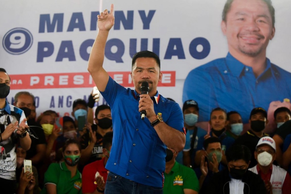 Philippine senator and retired boxing icon Manny Pacquiao, a presidential candidate for the 2022 election, gestures during his campaign rally at a cov...