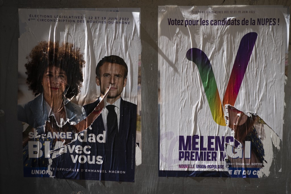 法國國民議會選舉，總統馬克宏所引領的同在聯盟痛失絕對多數優勢，未來執政面臨巨大挑戰。（圖／美聯社）
