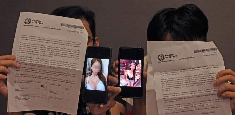 Chen and Lin holding up police reports. (Facebook, 原来是这样 new 保护人民 photo)
