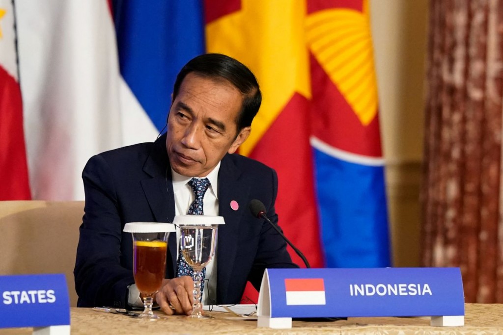 Indonesian President Joko Widodo listens as U.S. Vice President Kamala Harris speaks during an event with leaders of the Association of Southeast Asia...