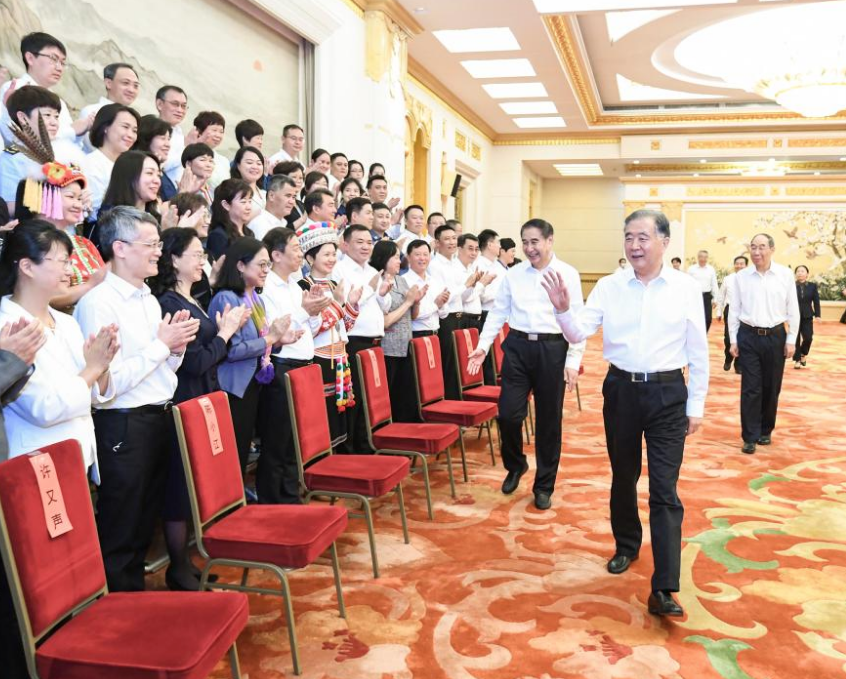 China leader Wang Yang salutes “CPC members of Taiwan origin” on Sunday in Beijing. (Xinhua photo)
