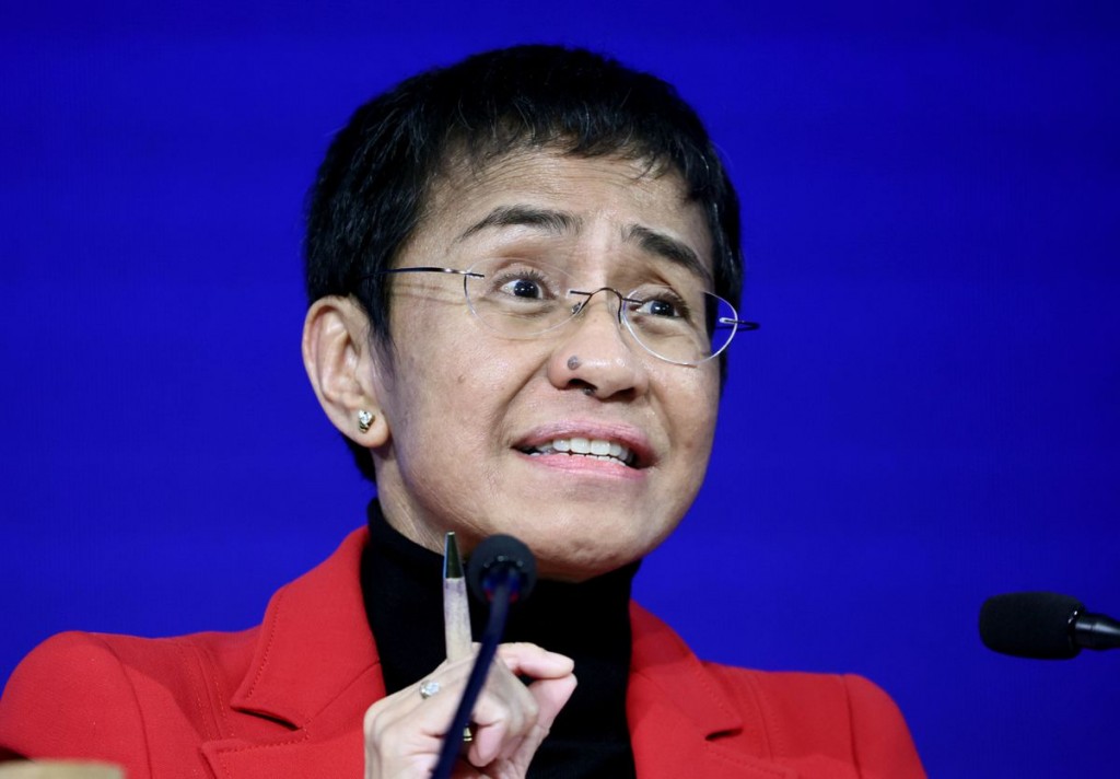 Nobel Peace Prize co-winner 2021 Maria Ressa attends a ceremony for World Press Freedom day at the Graduate Institute in Geneva, Switzerland May 3, 20...