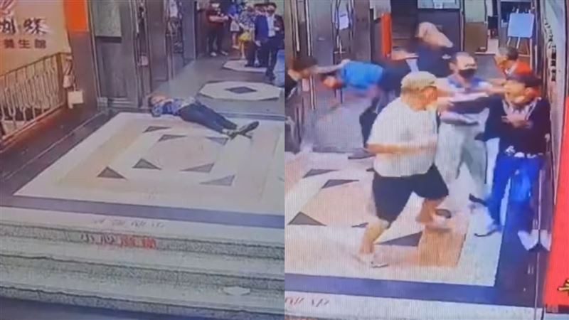 A man surnamed Hu is beaten up and left on the floor. (Baofei Commune video screenshot)
