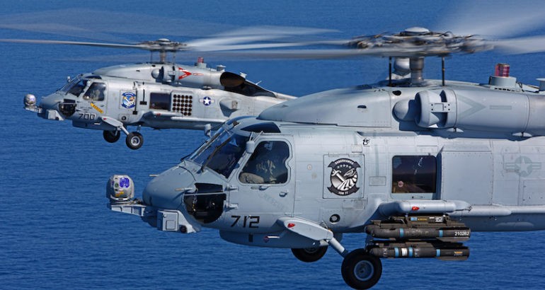 A pair of US Navy Sikorsky MH-60R Seahawks cruise over the Pacific Ocean. (Sikorsky/Lockheed Martin photo)
