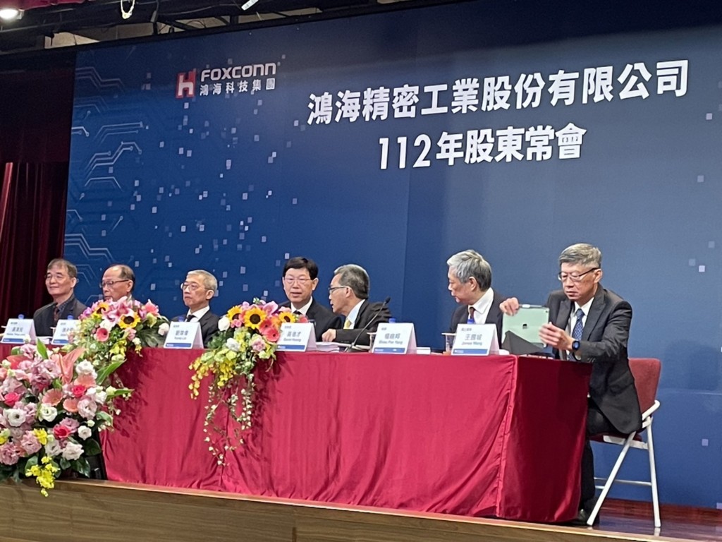Foxconn Chair Young Liu (center) presides over an investors' meeting at company headquarters in New Taipei City Wednesday. 
