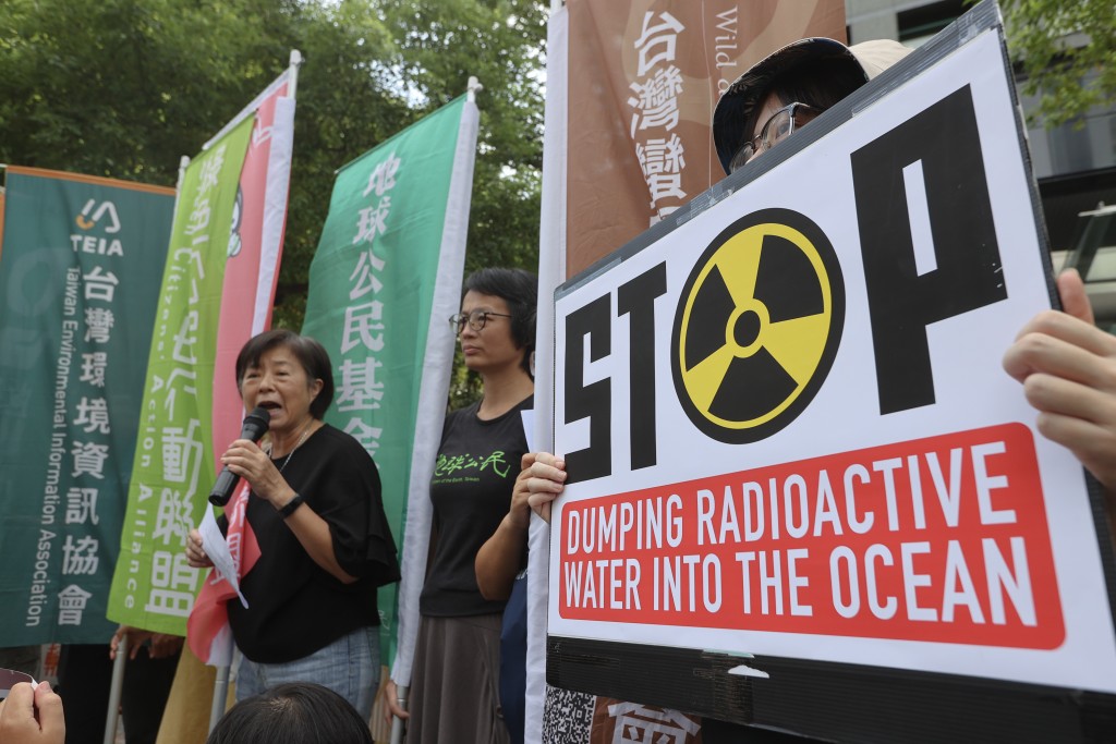 Protesters in Taipei condemn the release of treated water from the Fukushima nuclear power plant Wednesday. 
