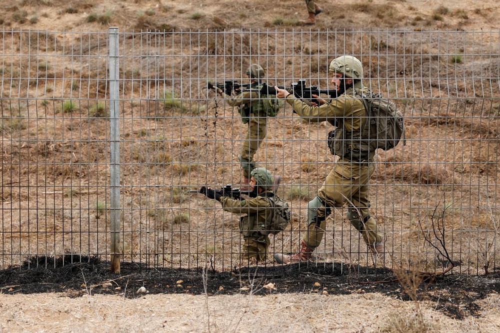以色列哈瑪斯衝突，以色列士兵加強巡邏（圖／路透社Amir Cohen）
