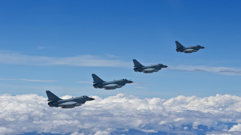 Chengdu J-10 fighter jets fly in formation. (China Ministry of National Defense photo)

