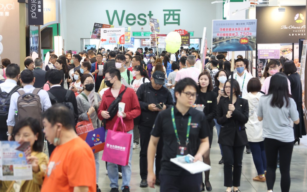 Visitors at the Taipei International Travel Fair Friday. 
