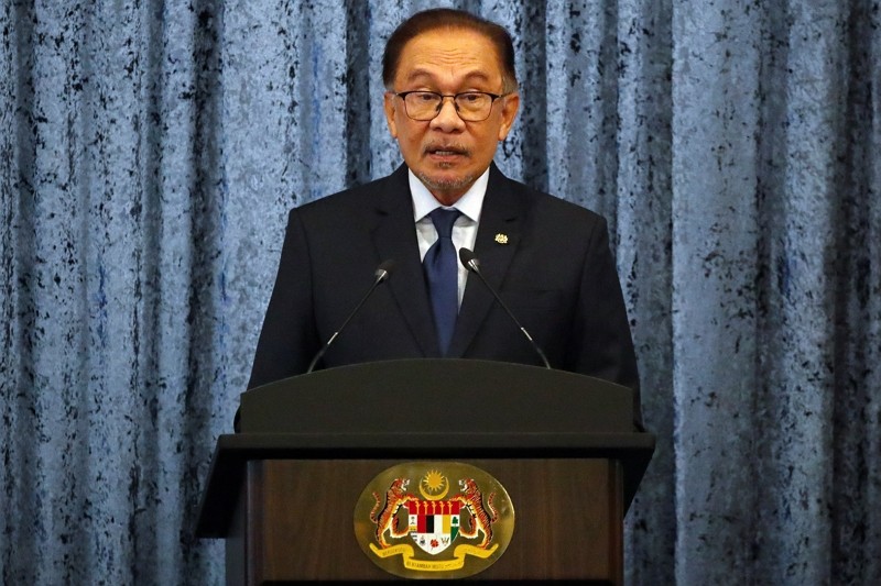 Malaysia Prime Minister Anwar Ibrahim speaks at a press conference during Japanese Prime Minister Fumio Kishida's official visit, a...