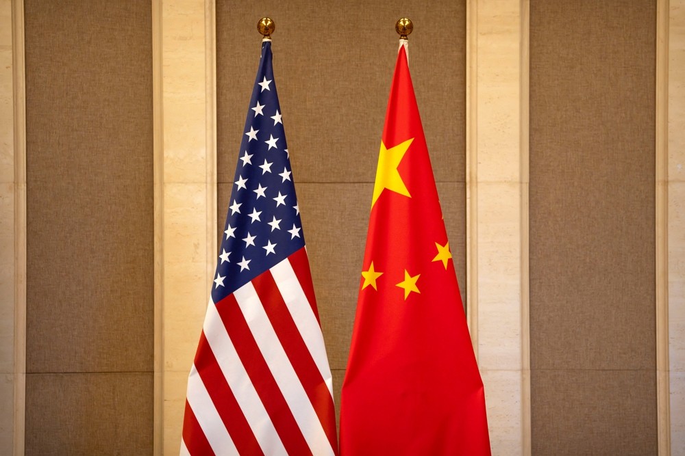 United States and Chinese flags are set up before a meeting between U.S. Treasury Sec...