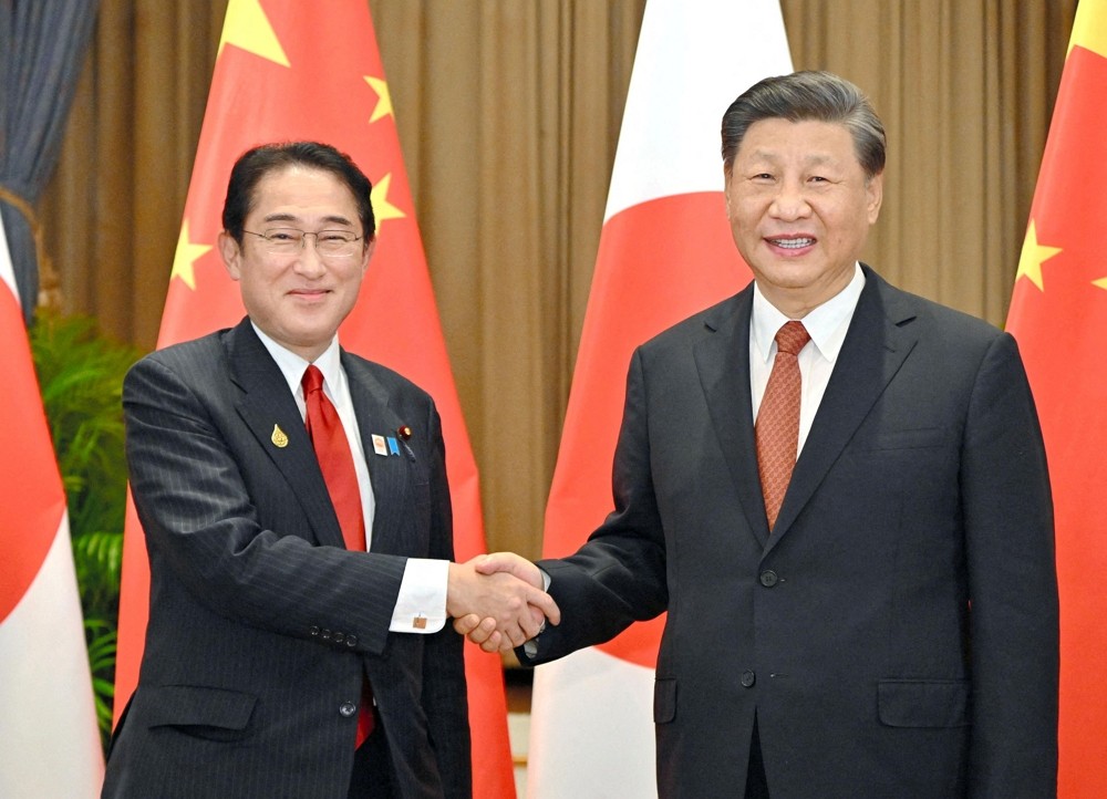 Japanese Prime Minister Fumio Kishida meets Chinese President Xi Jinping on the sidelines ...
