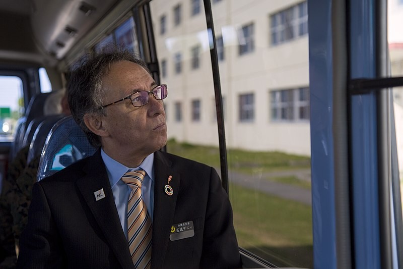 Okinawa Governor Denny Tamaki on a visit to a US military base in 2019. 
