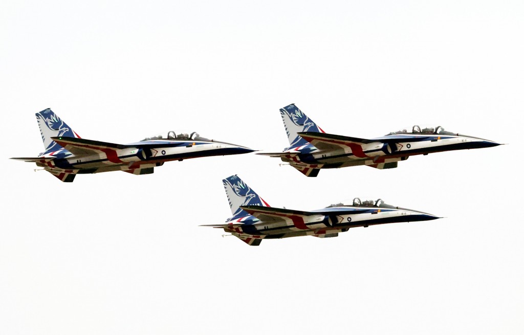 "Brave Eagle" training jets in the skies above Gangshan Air Force Base in Kaohsiung City Friday. 
