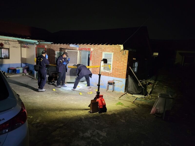 Police investigate the site of a shooting in Tainan, Dec. 1. 
