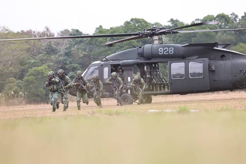 Army special forces pile out of Blackhawk helicopter. (Facebook, Army Special Operations Command photo)
