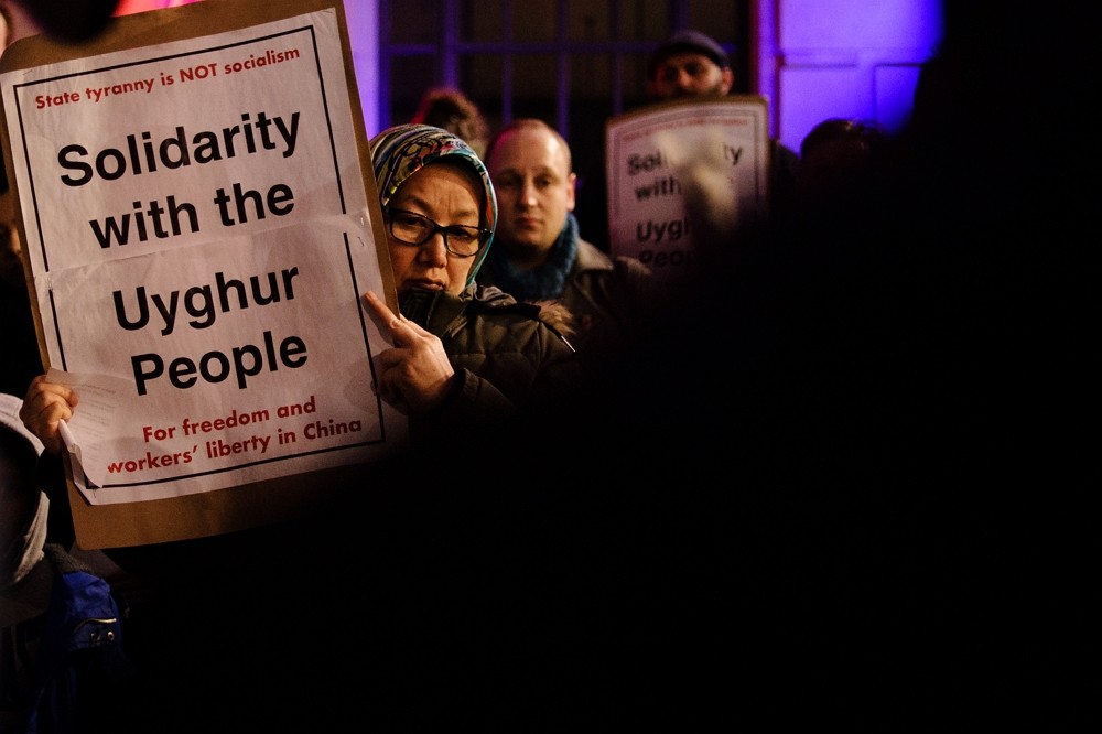Uighur rights activists stage a demonstration outside the Chinese Embassy in London, England, on January 5, 2020. David Cliff via Reuters&nb...