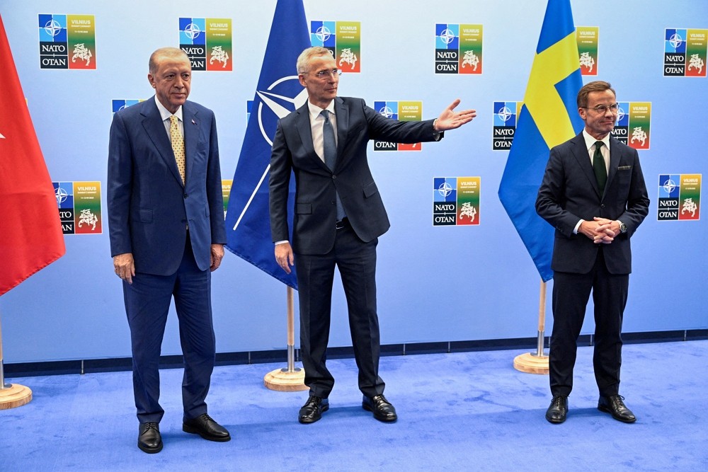 Turkish President Tayyip Erdogan, Swedish Prime Minister Ulf Kristersson and NATO Secretary-General Jens Stoltenber...