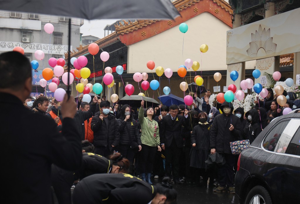 Mourners release balloons in New Taipei on Thursday to farewell a student who died after being attacked by a classmate in December, 2023. (CNA ph...