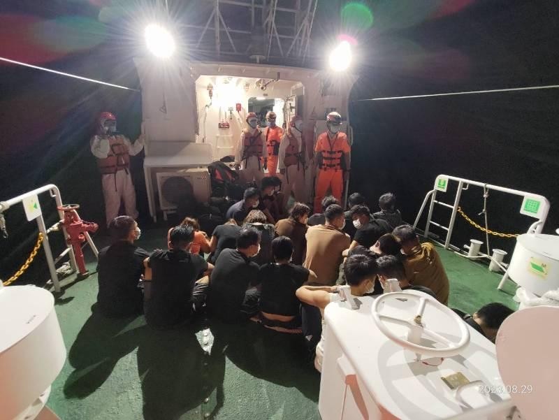 A group of Vietnamese nationals attempting to illegally enter Taiwan are detained by the Coast Guard in August, 2023. (Taiwan Coast Guard photo)
