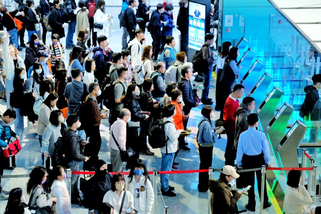 Travelers lining up for the e-Gates at Taoyuan International Airport. 
