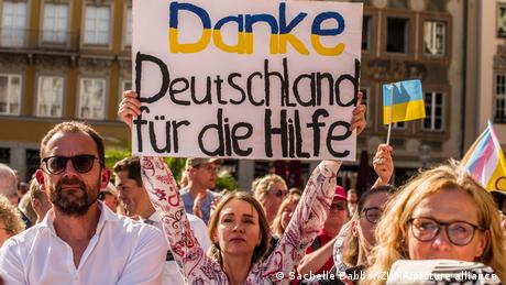 This poster held up by a Ukrainian at a rally in Munich last August reads 'Thank you Germany for the help'