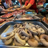 Taiwan's central government bats down local bans on US pork