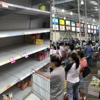 Taiwanese empty supermarket shelves as local COVID cases rise