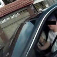 Taipei cop fines couple for drinking water in car