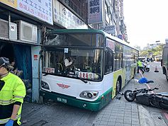 New Taipei bus rams into sidewalk storefronts