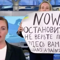 Taiwan lauds woman who held 'no war' sign on Russian TV