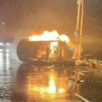 Passerby saves drunk Tesla driver just before car engulfed by flames in New Taipei