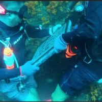 Family places stele underwater off Taiwan’s Penghu to memorialize missing loved one