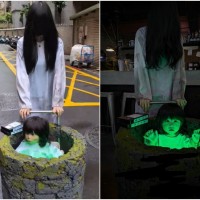 Photo of the Day: Mini-Sadako emerges from well in New Taipei