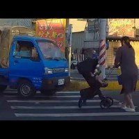Video shows blue truck nearly hit stroller on western Taiwan crosswalk