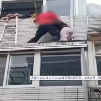 Woman rescued from 2nd-floor awning in northeastern Taiwan